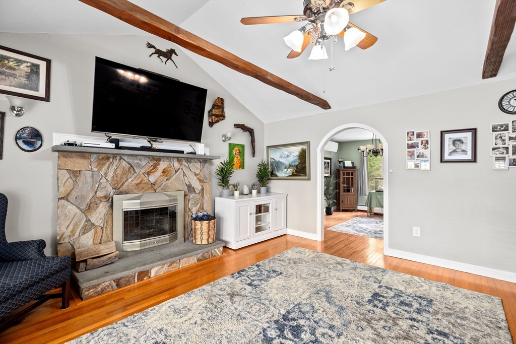 39 High Street Freetown, MA 02702 - Photo 7 of 42 a living room with fireplace furniture and a flat screen tv