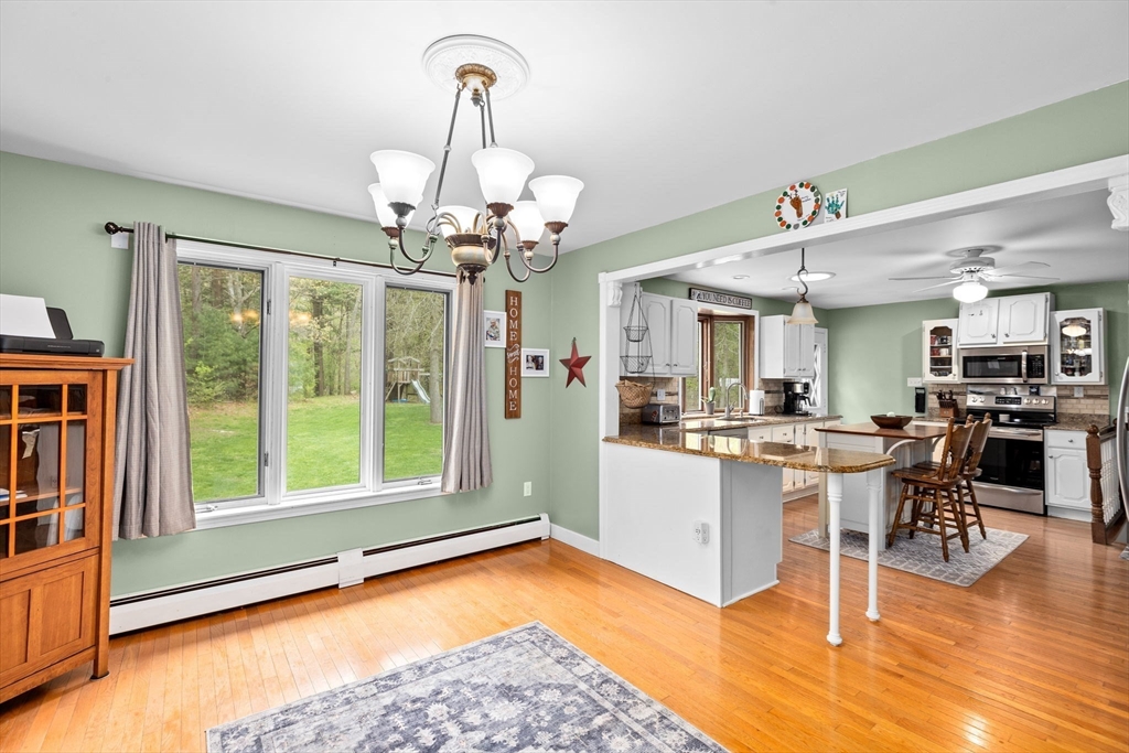 39 High Street Freetown, MA 02702 - Photo 10 of 42 a view of a dining room with furniture window and wooden floor