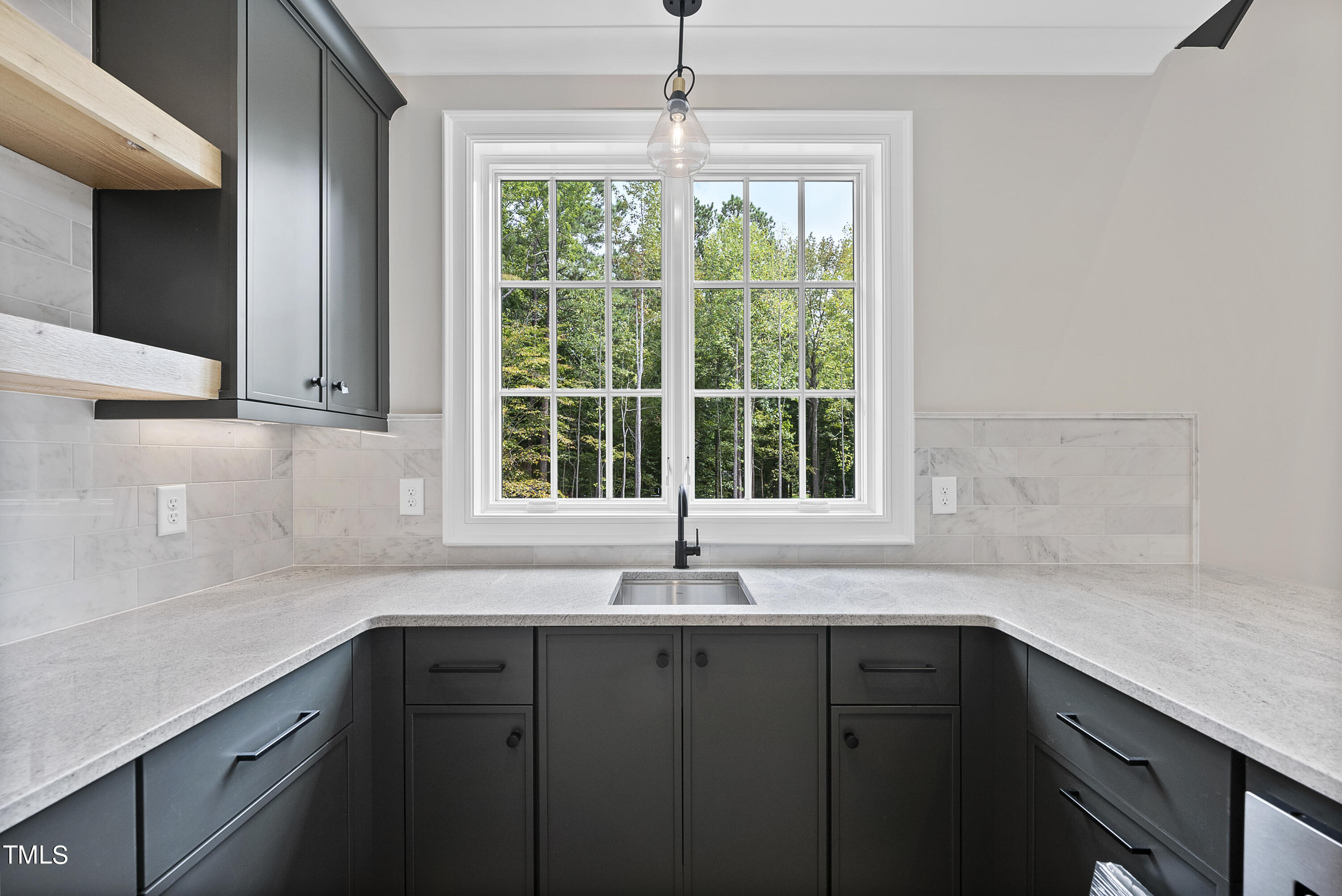 5824 Norwood Rdg Drive Raleigh, NC 27614 - Photo 46 of 65 a kitchen with a sink and a window