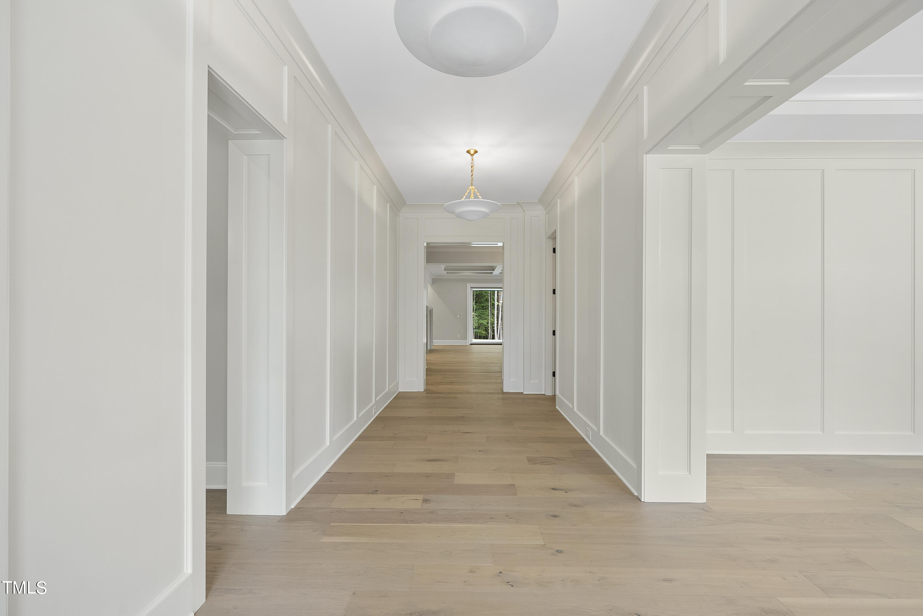 5824 Norwood Rdg Drive Raleigh, NC 27614 - Photo 8 of 65 a view of a hallway with wooden floor and staircase
