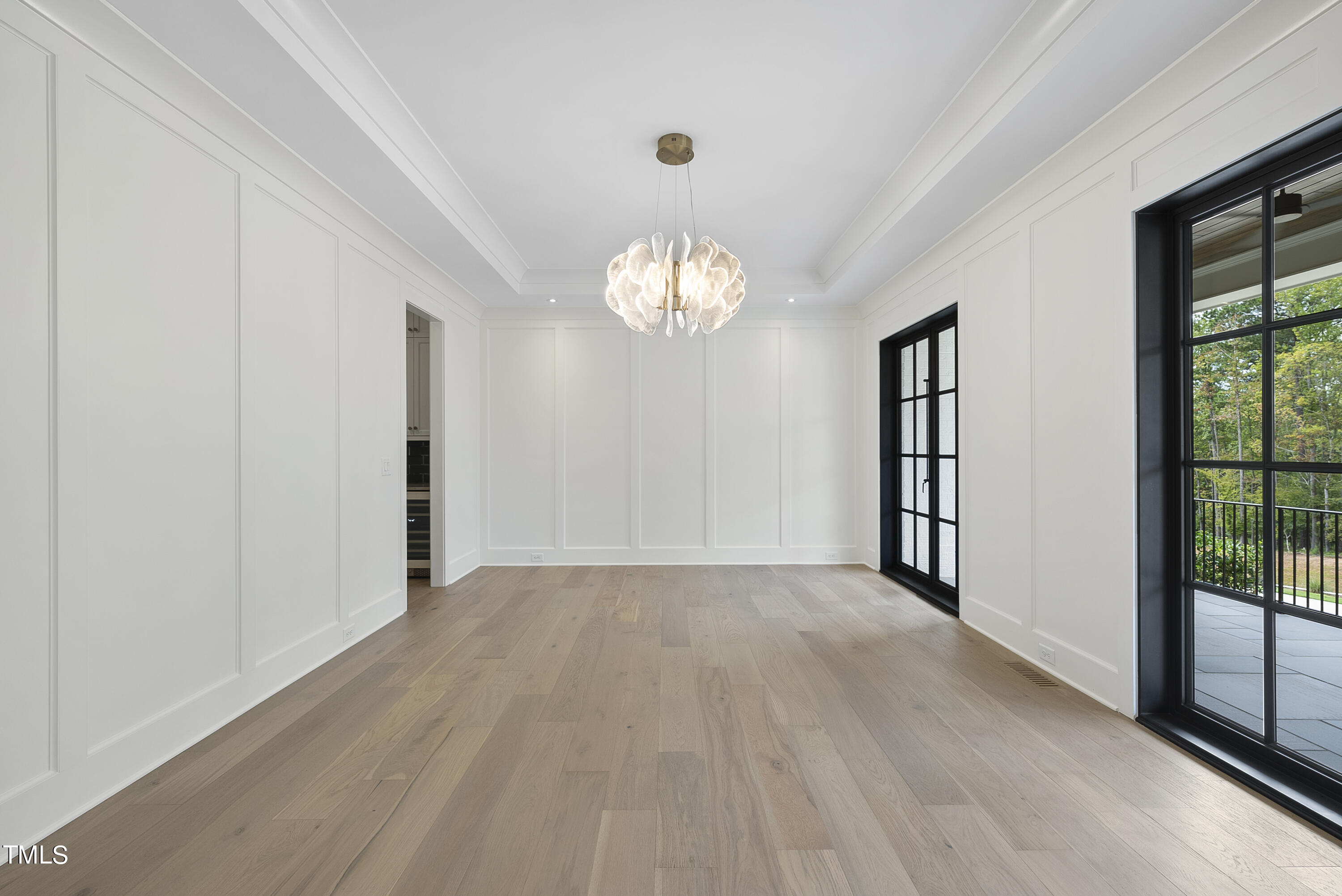 5824 Norwood Rdg Drive Raleigh, NC 27614 - Photo 9 of 65 wooden floor in an empty room with a window