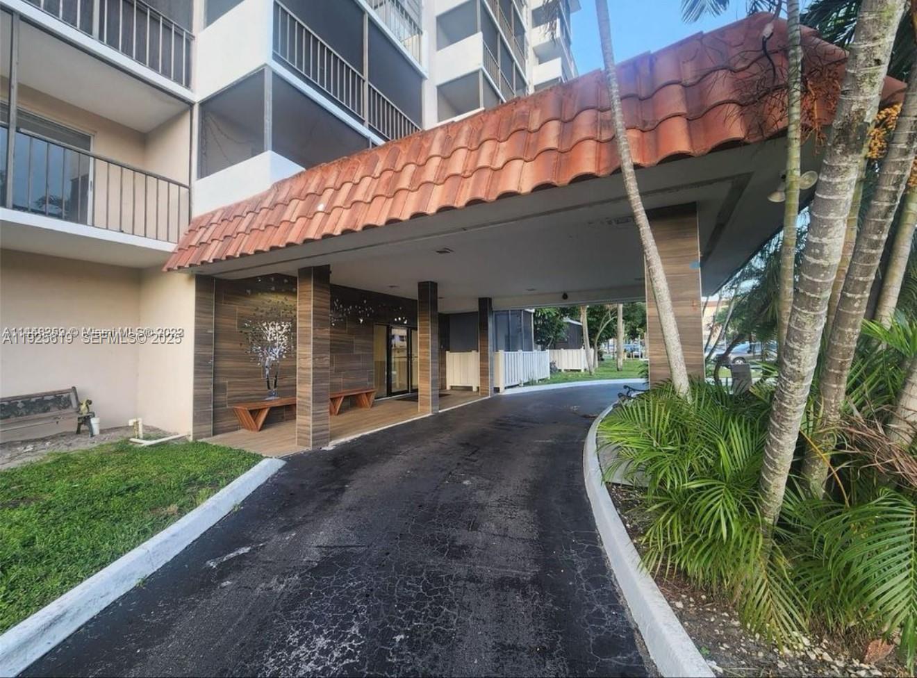 4164 Inverrary Drive, Unit 406 Lauderhill, FL 33319 - Photo 1 of 13 a view of a house with a yard