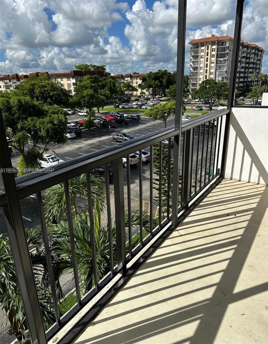 4164 Inverrary Drive, Unit 406 Lauderhill, FL 33319 - Photo 11 of 13 a view of city from a balcony