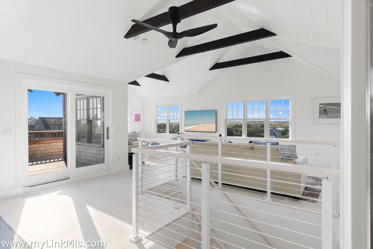 3 Tautemo Way Nantucket, MA 02554 - Photo 13 of 57 a view of a livingroom with furniture a ceiling fan and window