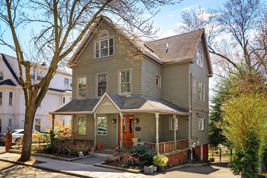 70 Oxford Street Somerville, MA 02143 - Photo 32 of 38 a front view of a house with garden