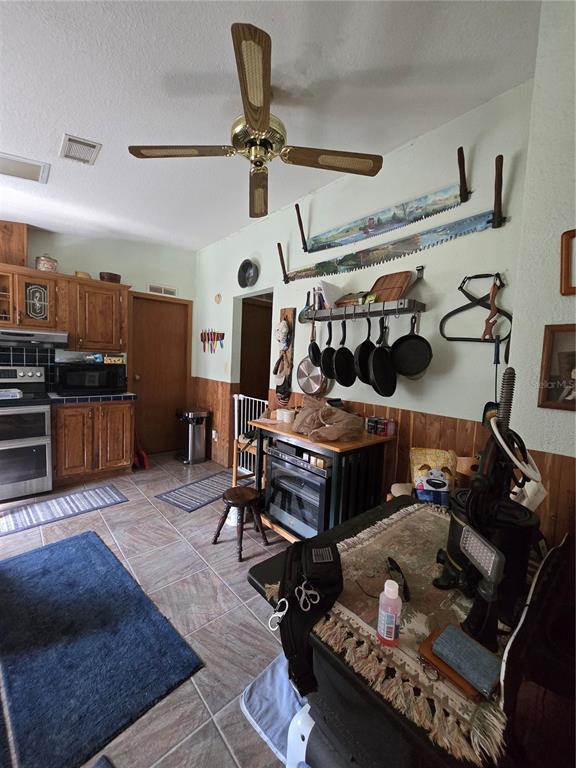 4901 Northwest 152nd Lane Reddick, FL 32686 - Photo 11 of 13 a view of a room with gym equipment