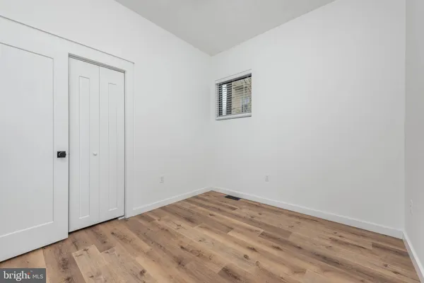 an empty room with a workbench