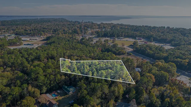 an aerial view of residential house with outdoor space