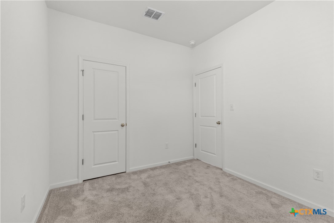 430 Line Of Fire Way Jarrell, TX 76537 - Photo 14 of 28 a view of an empty room