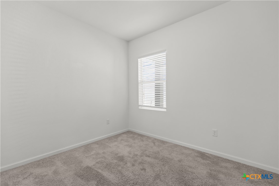 430 Line Of Fire Way Jarrell, TX 76537 - Photo 21 of 28 an empty room with a window