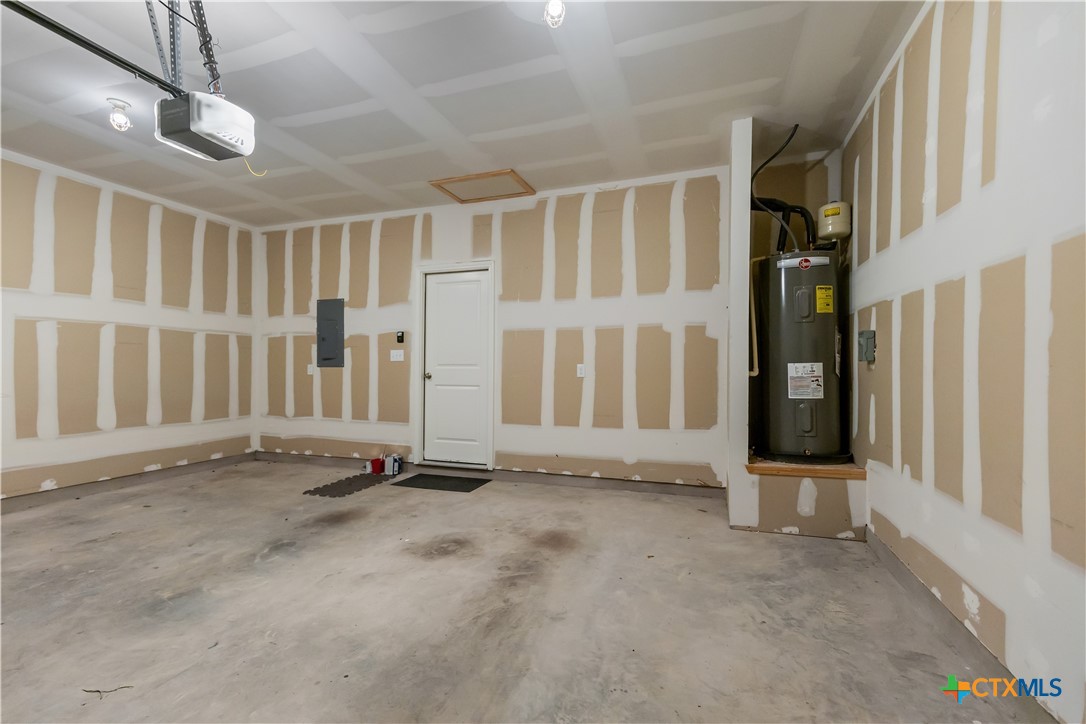 430 Line Of Fire Way Jarrell, TX 76537 - Photo 23 of 28 an empty room with entrance and windows