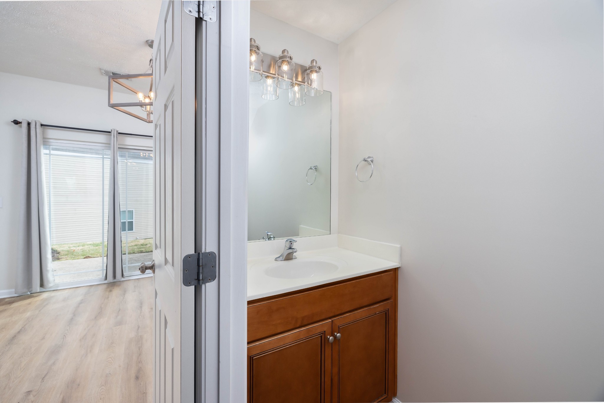 1011 Somerset Springs Drive Spring Hill, TN 37174 - Photo 13 of 28 a bathroom with a sink and a mirror