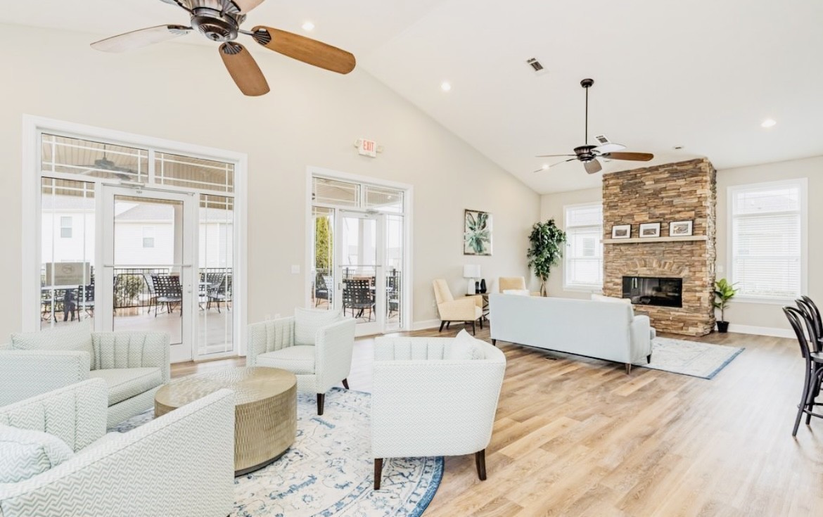 1011 Somerset Springs Drive Spring Hill, TN 37174 - Photo 27 of 28 a living room with furniture or couches and a fireplace