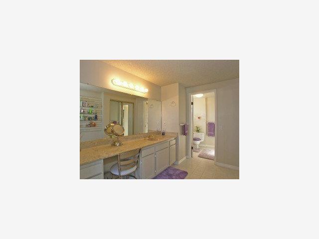 728 Ranger Circle Foster City, CA 94404 - Photo 7 of 9 a bathroom with a sink a mirror and a bathtub