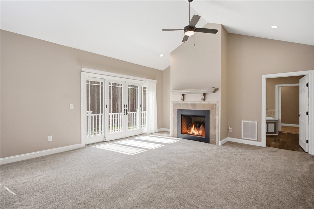 196 Flyroot Trail Pickens, SC 29671 - Photo 16 of 48 This inviting living area features a fireplace and abundant natural light.