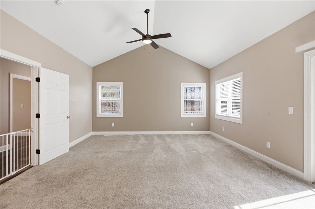 196 Flyroot Trail Pickens, SC 29671 - Photo 18 of 48 This spacious room features vaulted ceilings and ample natural light, ideal for peaceful living.