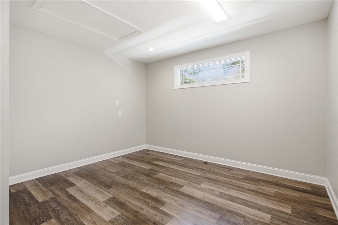 196 Flyroot Trail Pickens, SC 29671 - Photo 24 of 48 This spacious room offers versatile living with durable flooring and natural light.