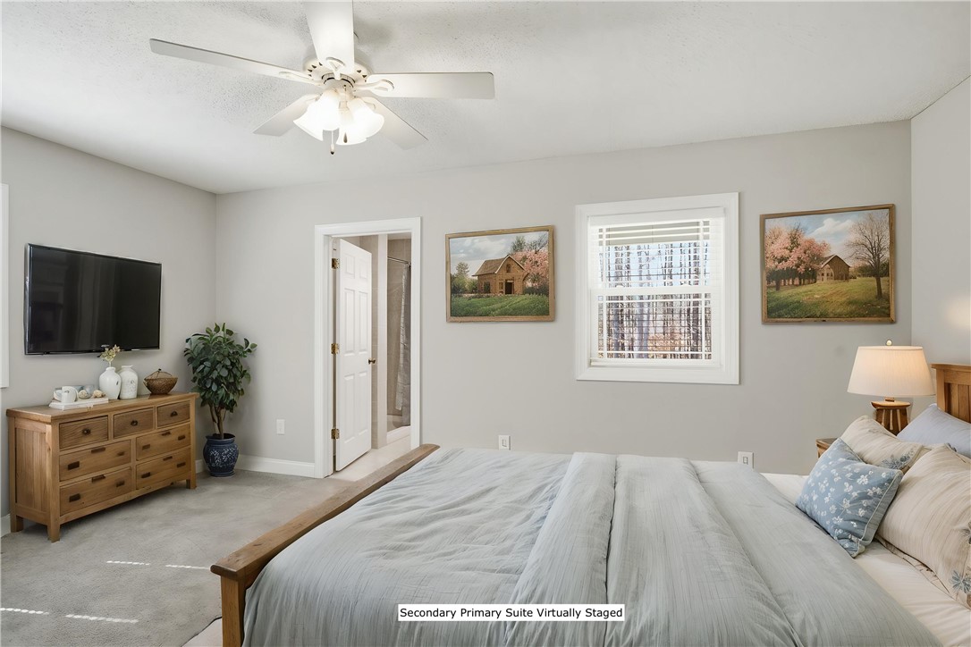 196 Flyroot Trail Pickens, SC 29671 - Photo 25 of 48 This tranquil bedroom features plush carpeting and a convenient en-suite bathroom.