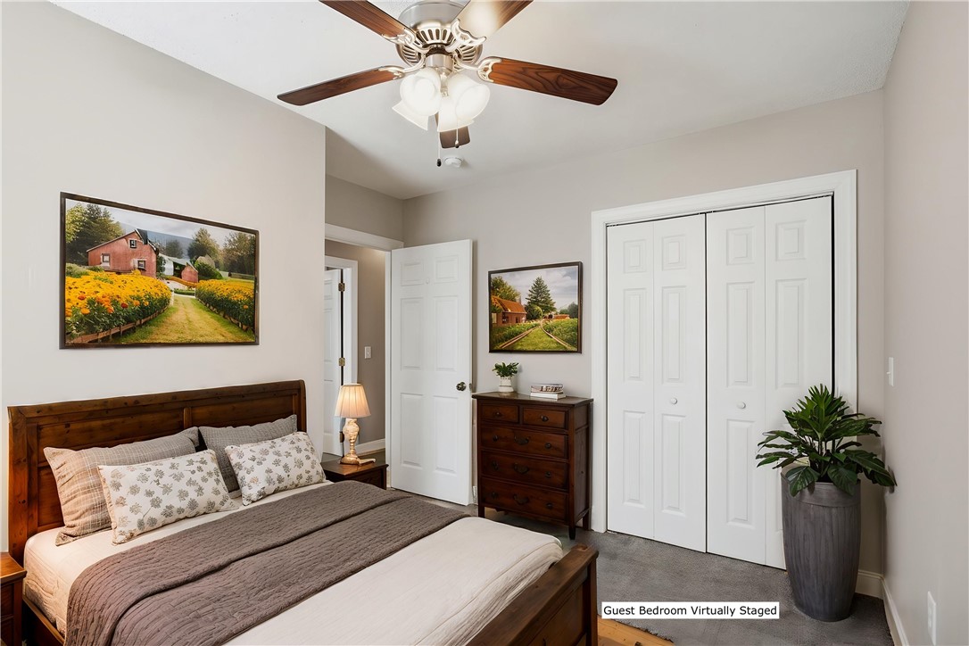 196 Flyroot Trail Pickens, SC 29671 - Photo 28 of 48 This cozy bedroom features warm wooden accents, soft lighting, and ample closet space.