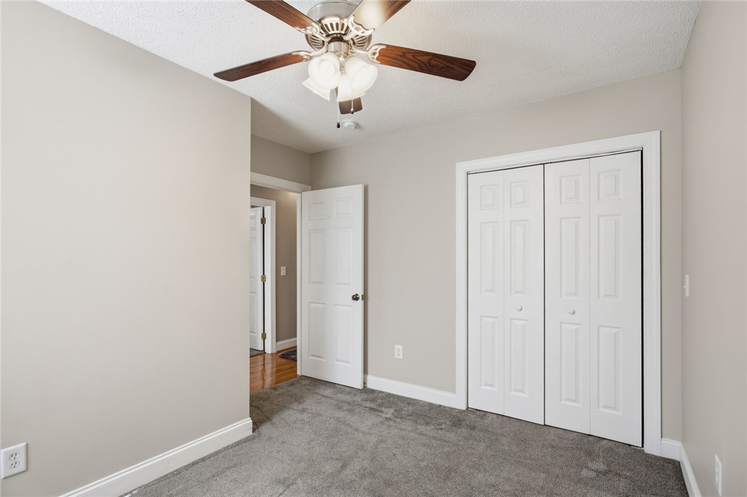 196 Flyroot Trail Pickens, SC 29671 - Photo 29 of 48 This cozy bedroom features plush carpet flooring, a ceiling fan, and ample closet space.