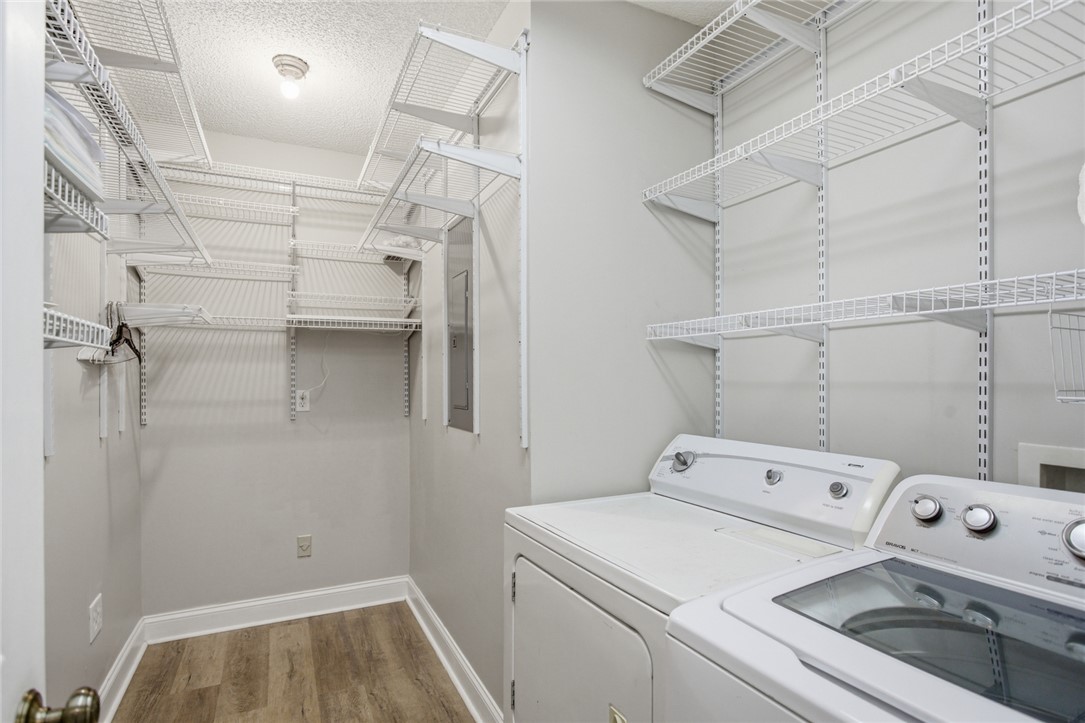 196 Flyroot Trail Pickens, SC 29671 - Photo 31 of 48 This laundry area features convenient shelving and durable flooring, streamlining daily routines.