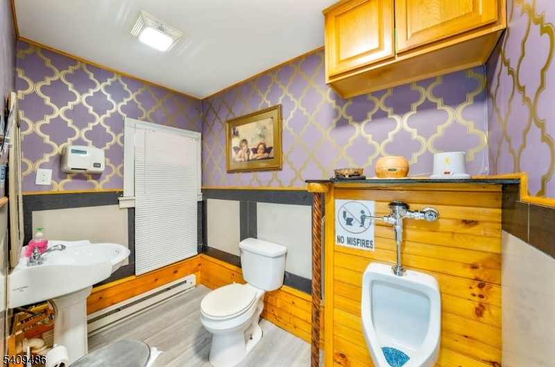 376 Elmora Avenue, Unit 378 Elizabeth, NJ 07208 - Photo 13 of 49 a bathroom with a sink and a mirror