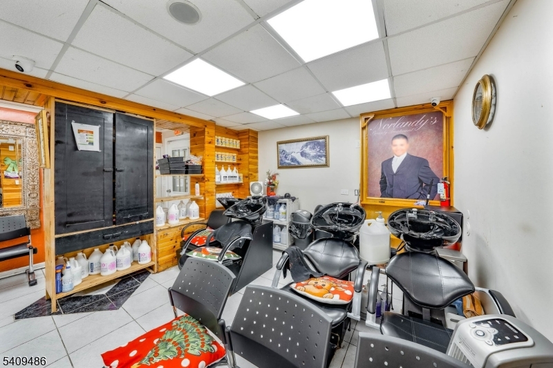 376 Elmora Avenue, Unit 378 Elizabeth, NJ 07208 - Photo 16 of 49 a room with furniture and a window