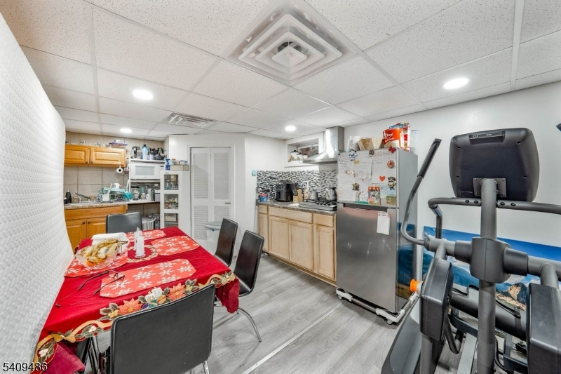 376 Elmora Avenue, Unit 378 Elizabeth, NJ 07208 - Photo 23 of 49 a bed room with a bed and furniture