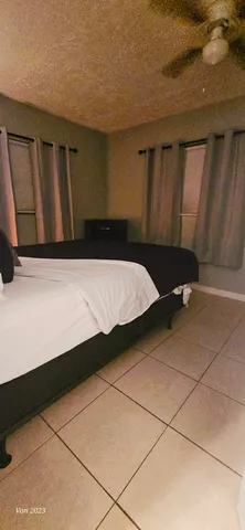 a wooden bench sitting in a room