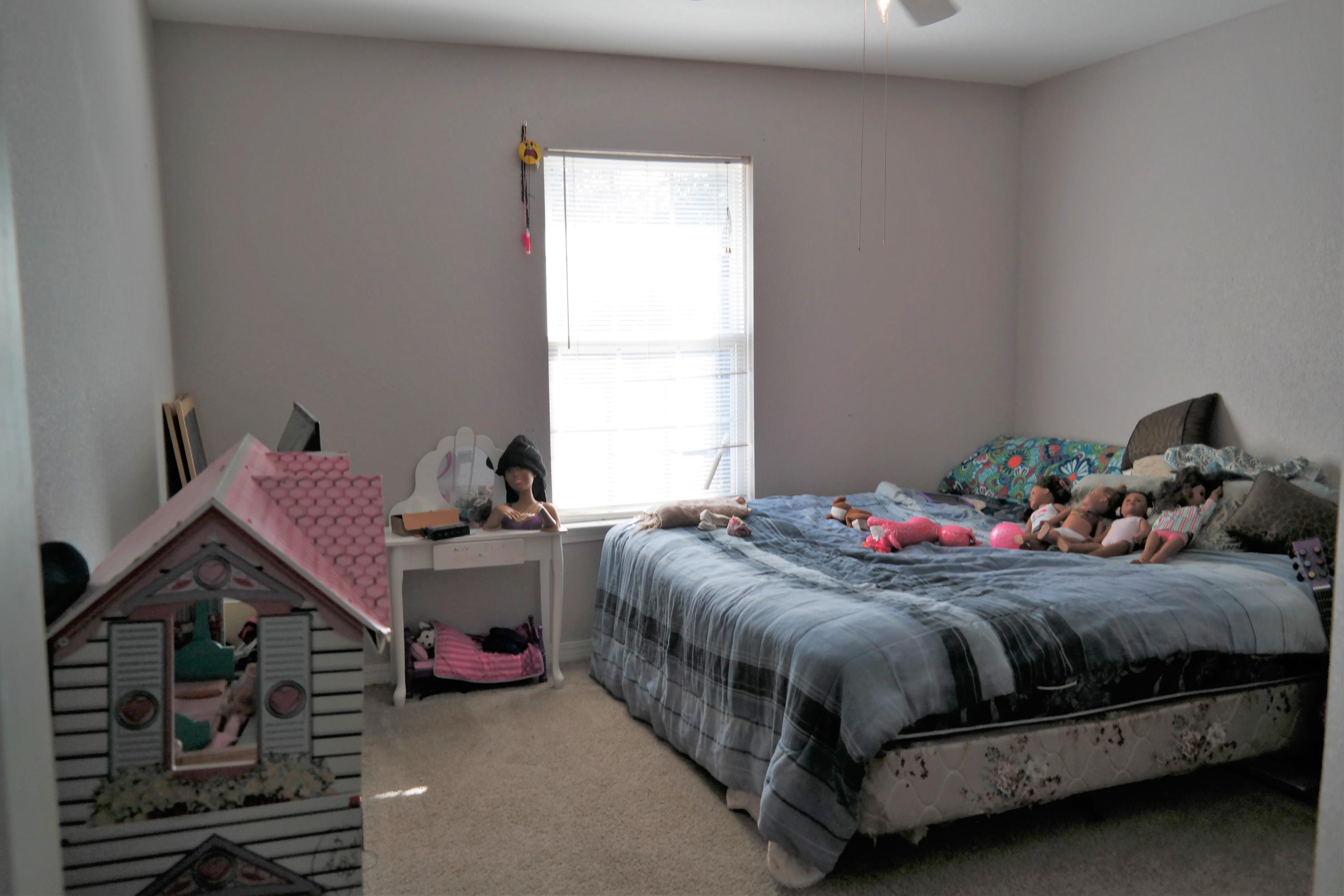 130 Crocus Avenue DeFuniak Springs, FL 32433 - Photo 15 of 24 a bedroom with a bed and a window