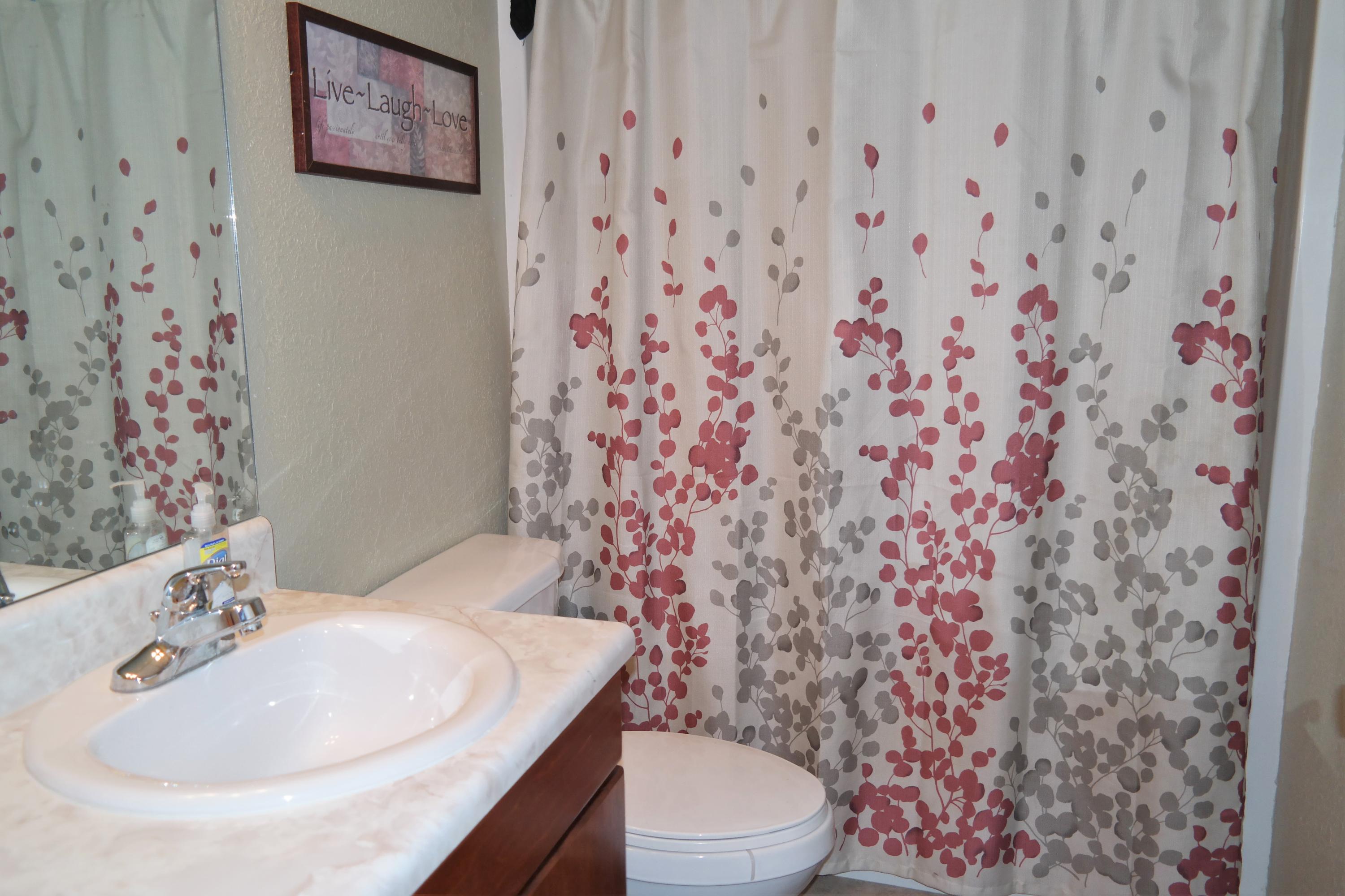 130 Crocus Avenue DeFuniak Springs, FL 32433 - Photo 16 of 24 a bathroom with a sink and toilet