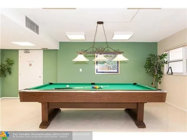 a room with pool table