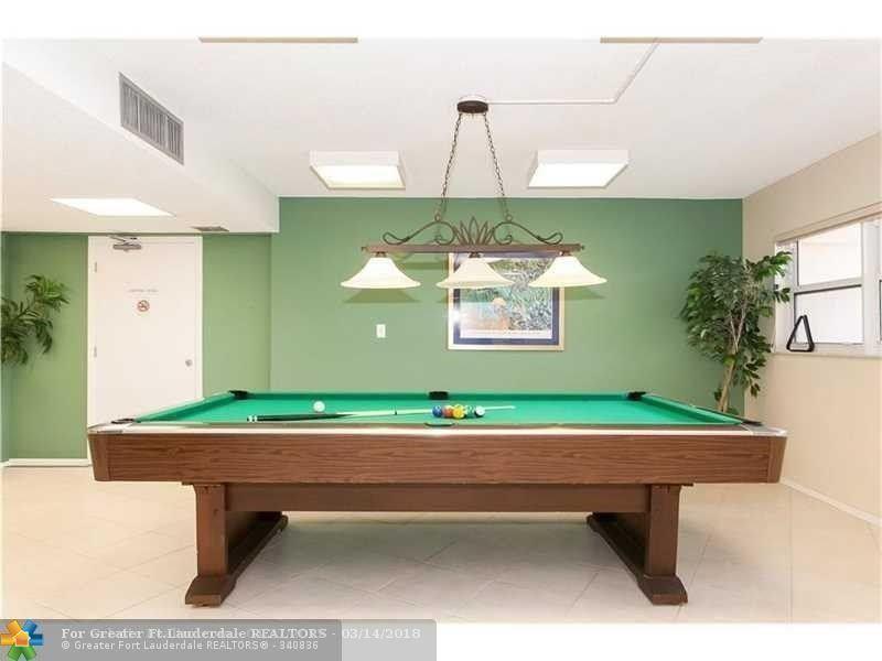 1200 Hibiscus Avenue, Unit 801 Pompano Beach, FL 33062 - Photo 11 of 12 a room with pool table