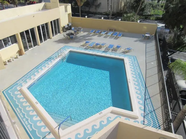 a view of balcony with furniture