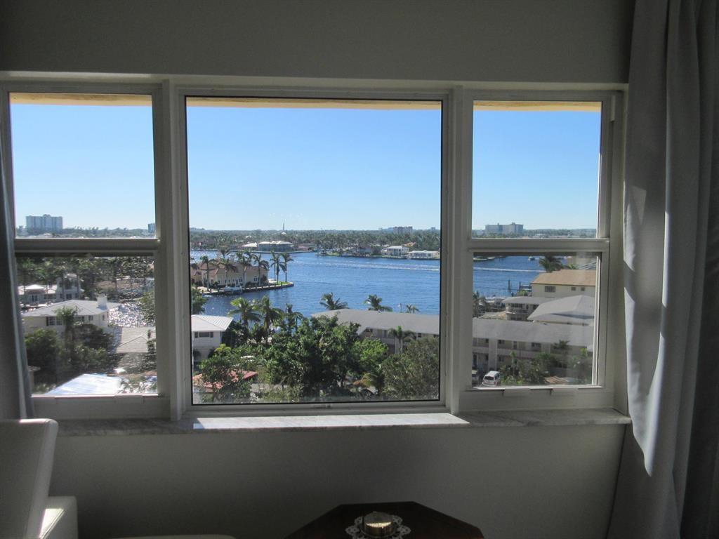 1200 Hibiscus Avenue, Unit 801 Pompano Beach, FL 33062 - Photo 4 of 12 a view of a glass door and a window