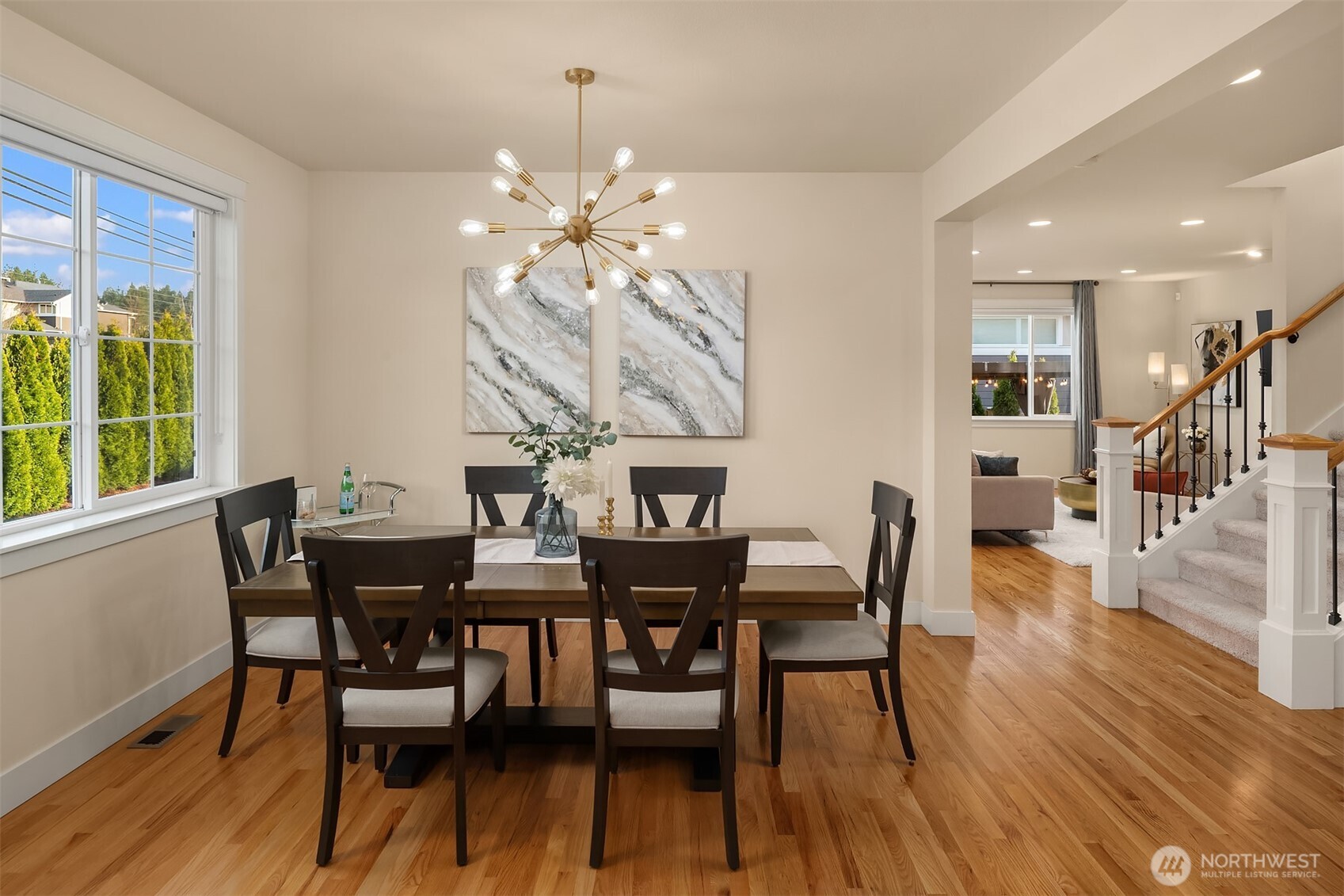 4106 167th Place Southeast Bothell, WA 98012 - Photo 14 of 35 a view of a dining room with furniture window and wooden floor