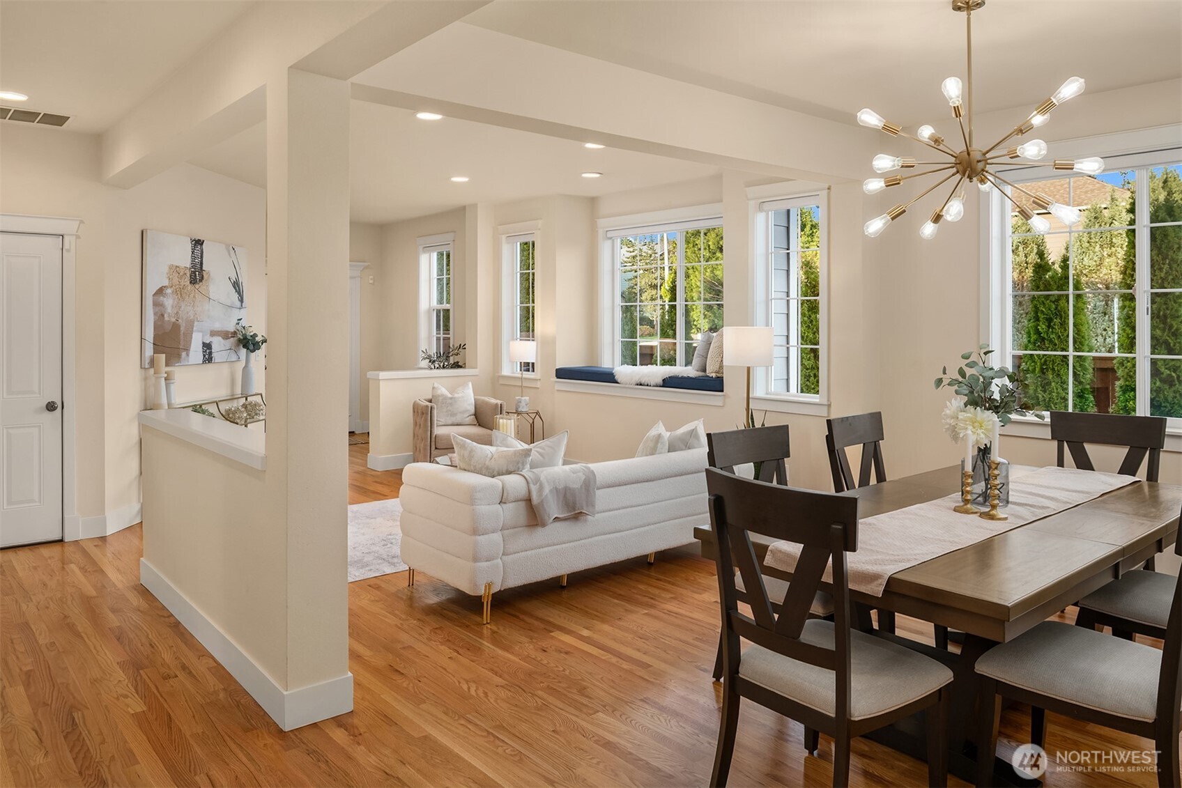 4106 167th Place Southeast Bothell, WA 98012 - Photo 15 of 35 a living room with furniture kitchen view and a wooden floor