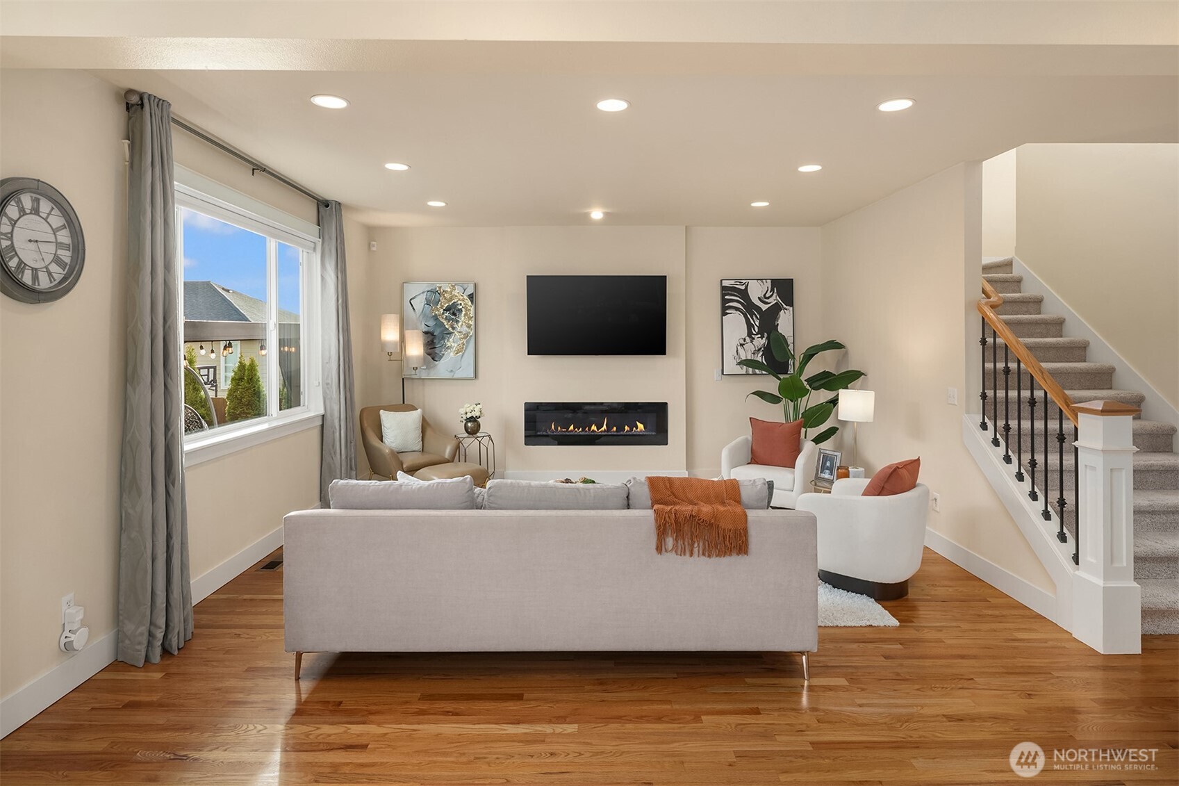 4106 167th Place Southeast Bothell, WA 98012 - Photo 19 of 35 a living room with furniture and a flat screen tv