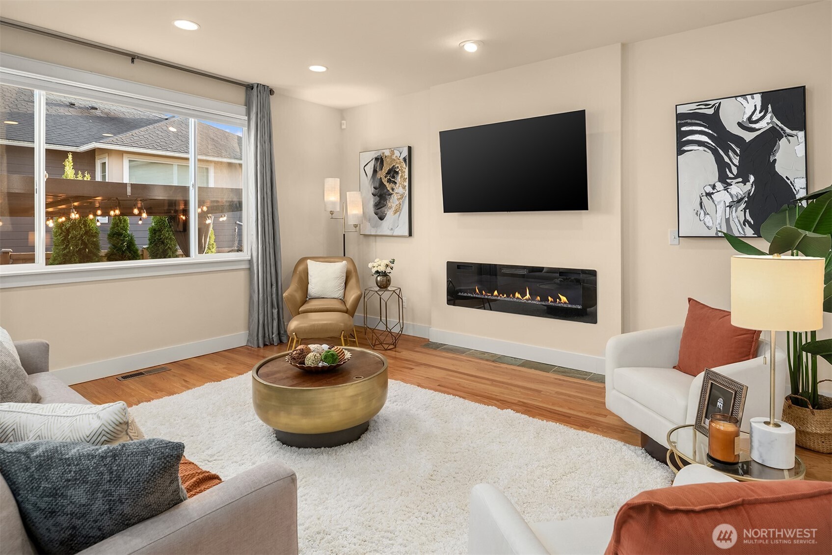 4106 167th Place Southeast Bothell, WA 98012 - Photo 20 of 35 a living room with furniture and a flat screen tv
