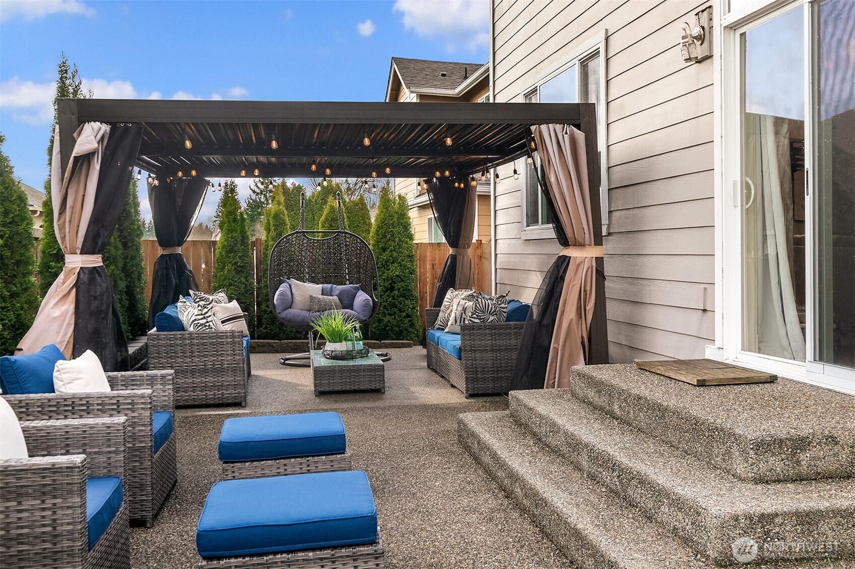 4106 167th Place Southeast Bothell, WA 98012 - Photo 2 of 35 a view of two chairs in the patio