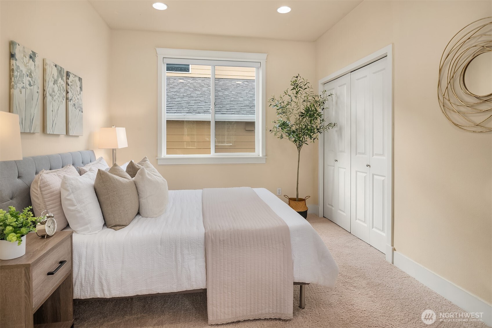 4106 167th Place Southeast Bothell, WA 98012 - Photo 24 of 35 a bedroom with a large bed and a window