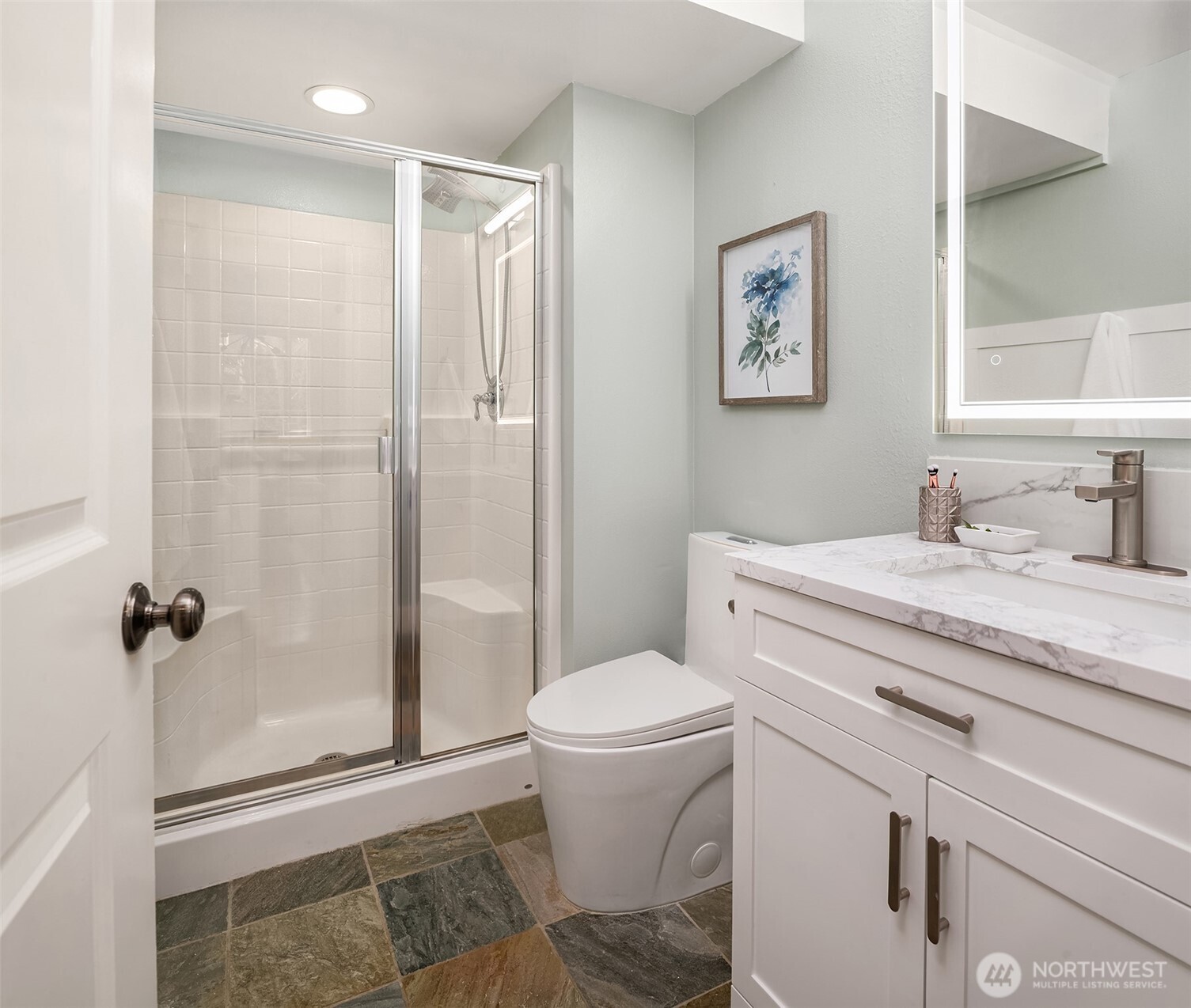 4106 167th Place Southeast Bothell, WA 98012 - Photo 25 of 35 a bathroom with a granite countertop sink toilet and shower