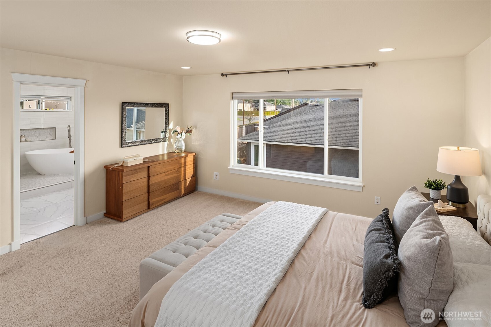 4106 167th Place Southeast Bothell, WA 98012 - Photo 28 of 35 a bedroom with a bed and a window