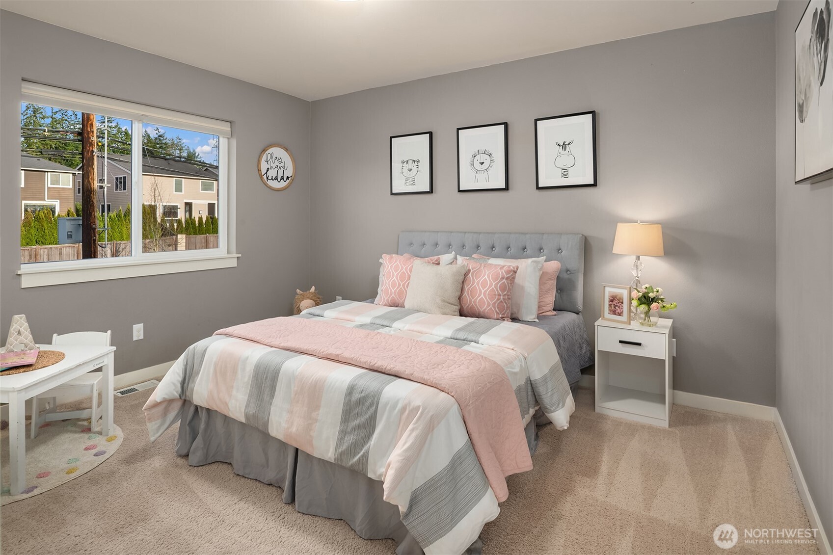 4106 167th Place Southeast Bothell, WA 98012 - Photo 30 of 35 a bedroom with a bed and a window