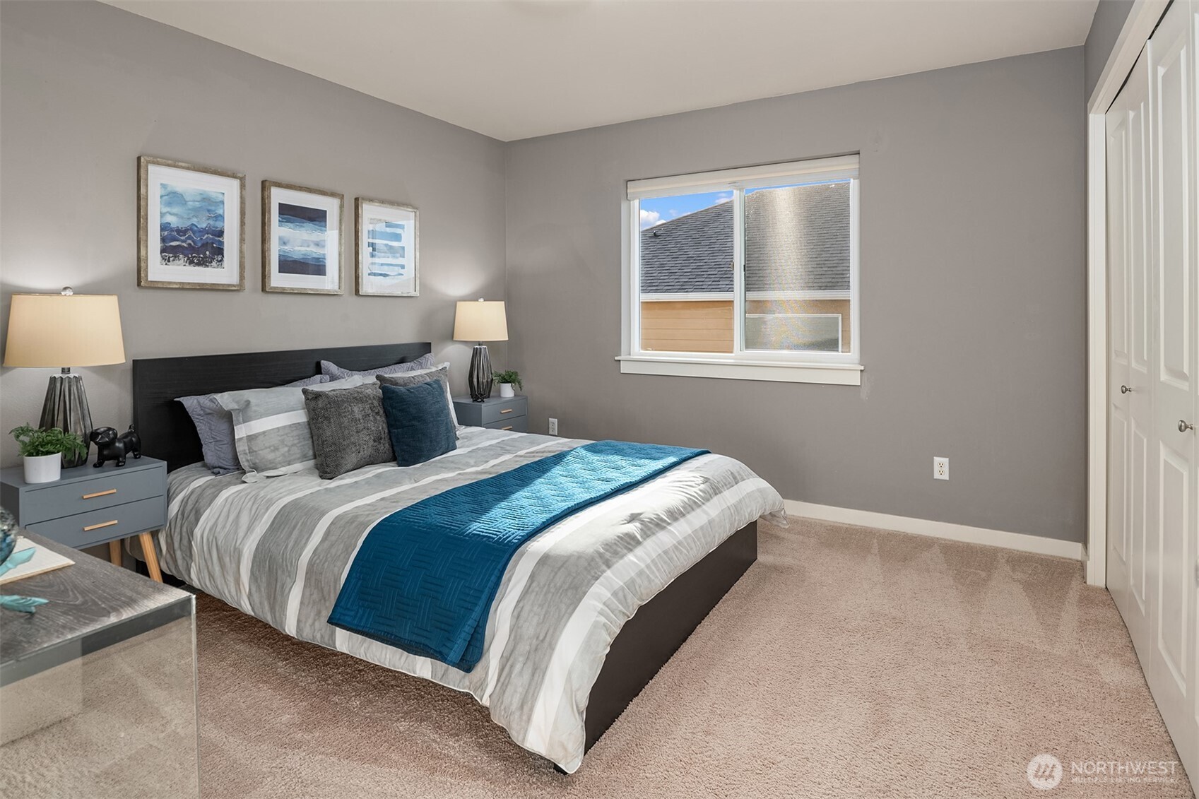 4106 167th Place Southeast Bothell, WA 98012 - Photo 31 of 35 a bedroom with a bed and a window