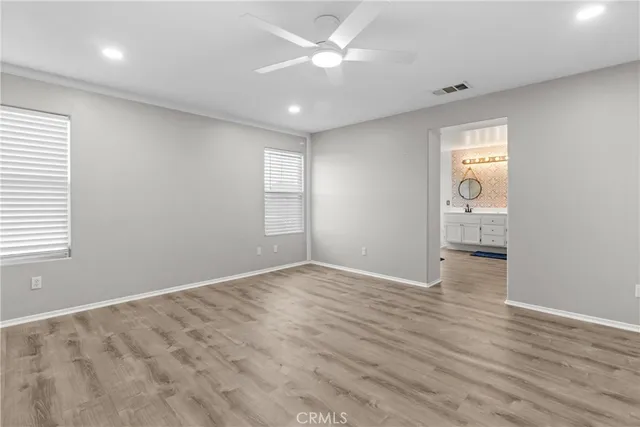 a bathroom with a sink a toilet and a shower