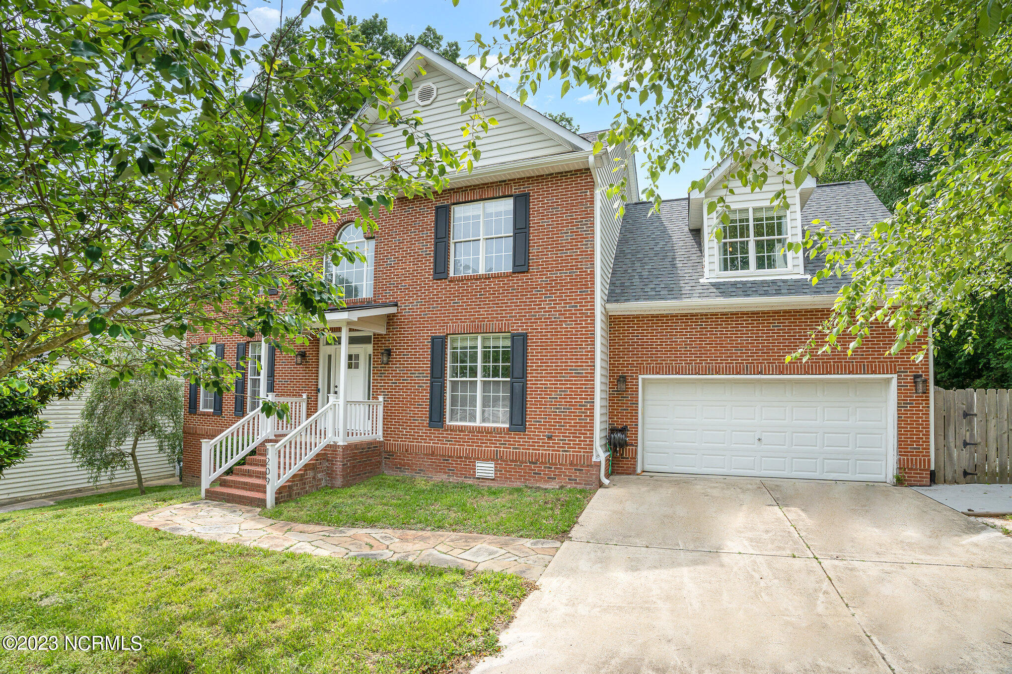 1209 Blackburn Road Apex, NC 27502 - Photo 1 of 38 Front 2