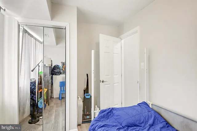 a view of hallway with closet and couch