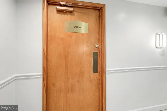 a bathroom with a glass door