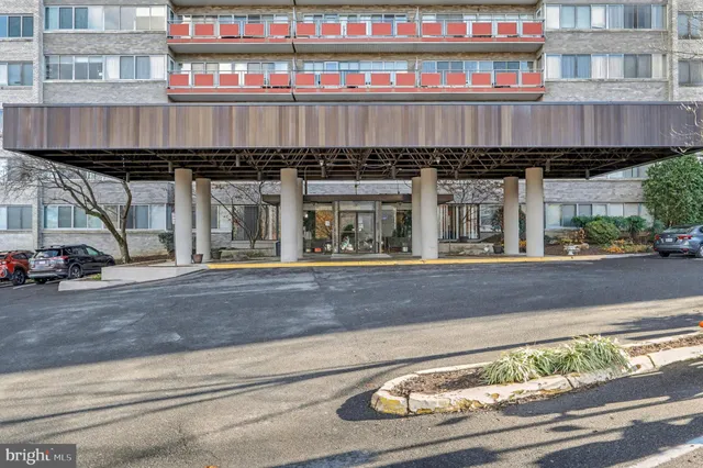 a view of a street with cars
